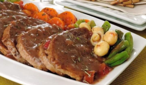 Lagarto ao molho madeira com legumes
